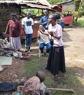 Hadijah Nangonzi engages with residents during her door-to-door campaign trail in Kiteete Parish, Namungo Sub-county.